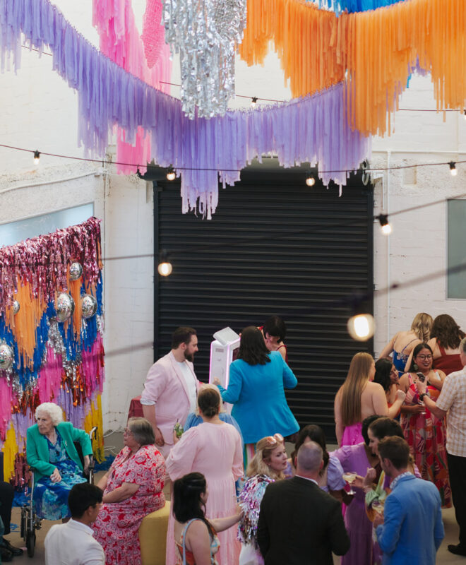 Guest enjoying a stylish cocktail event at The Wool Mill in Brunswick East. Contemporary urban venue with curated styling and a seamless event experience.