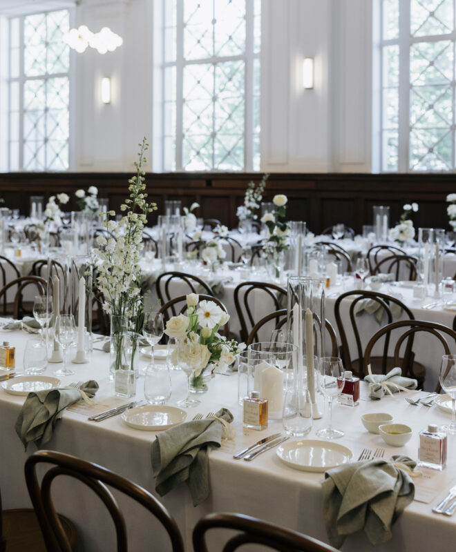 Beautiful seated reception styled by The Goodsmiths, featuring stunning white florals by Anatomy of Flowers in The Trust Melbourne's Grand Hall, creating an elegant and timeless atmosphere for a memorable wedding celebration.