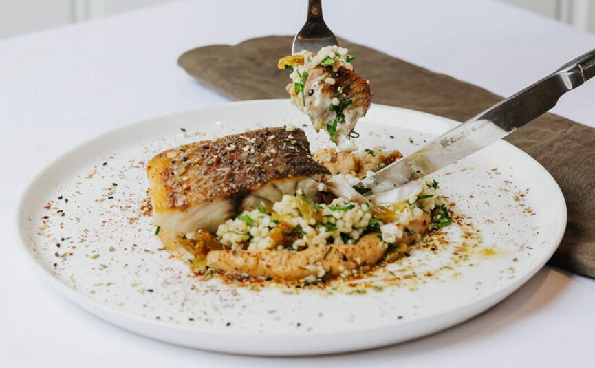 Delicious oven-roasted barramundi by Nudo Catering, showcasing fresh, premium ingredients for an exceptional dining experience at your next corporate or private event in Melbourne.