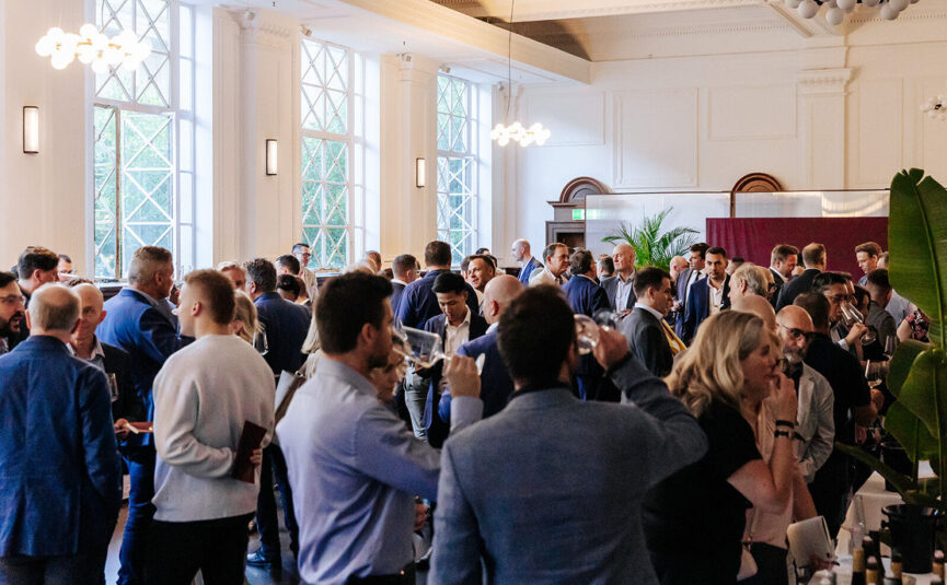 End-of-financial-year party at The Trust, a premier Nudo venue in Melbourne, with guests enjoying a stylish cocktail event, complemented by expertly crafted drinks and an elegant ambiance perfect for corporate celebrations.