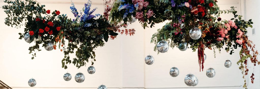 Disco ball and florals at The Wool Mill.